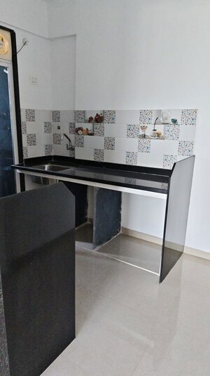 Kitchen in 1 BHK Apartment at Happy Valley, Manpada – for Rent
