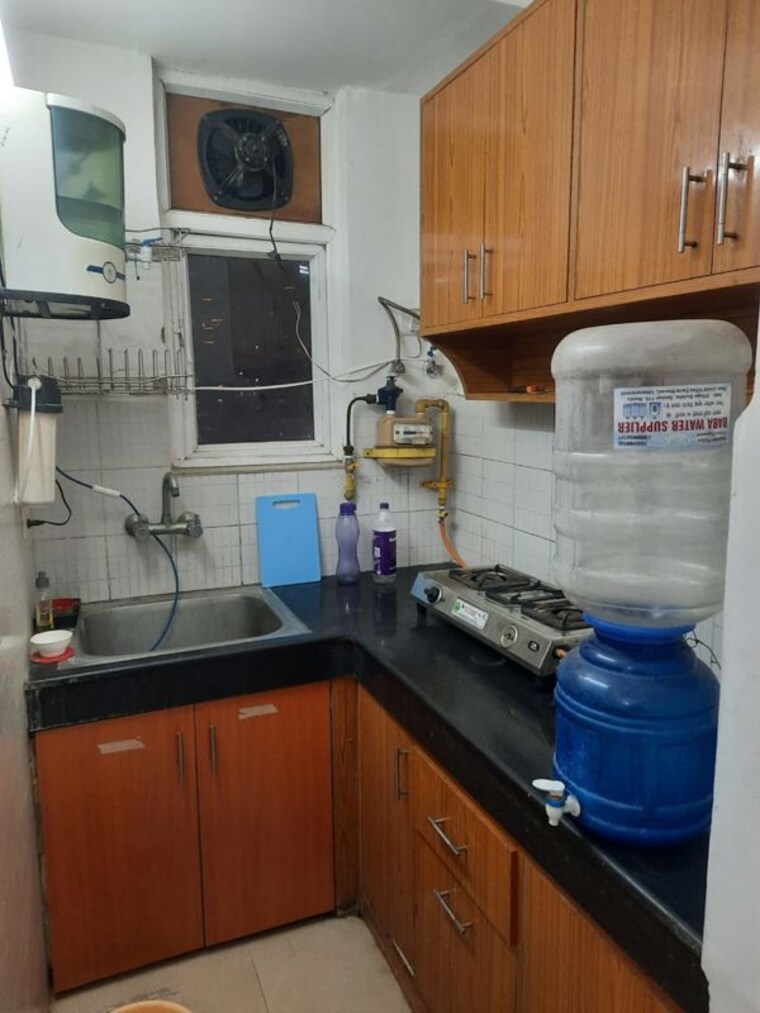 Kitchen, aditya-celebrity-homes 1 Bedroom 550 Sq.Ft. Apartment In Sector 76 Noida 10482928