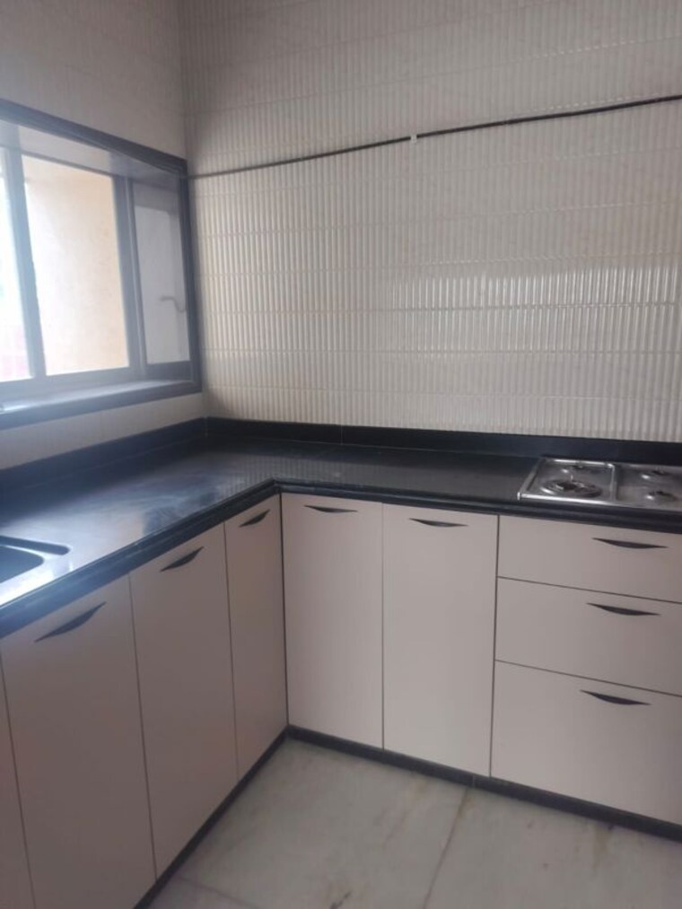 Kitchen, godrej-edenwoods 2 Bedroom 750 Sq.Ft. Apartment In Manpada Thane 10480238