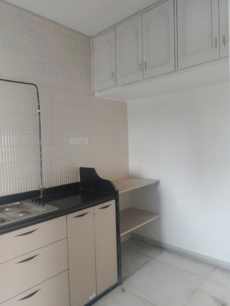 Kitchen, godrej-edenwoods 2 Bedroom 750 Sq.Ft. Apartment In Manpada Thane 10480238