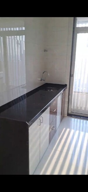 Kitchen in 2 BHK Apartment at Shreeji Atlantis, Malad West – for Sale