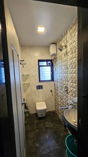 Bathroom in 2 BHK Apartment at Gemstar Nazarene Apartments, Malad West – for Rent