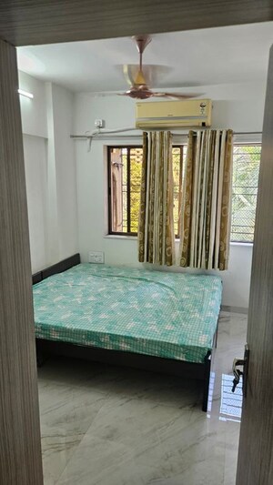 Bedroom in 2 BHK Apartment at Gemstar Nazarene Apartments, Malad West – for Rent
