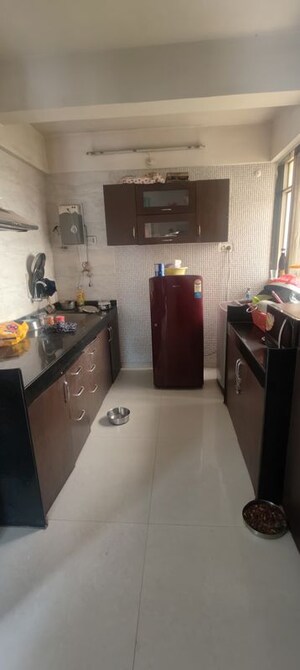 Kitchen in 2 BHK Apartment at GK Dwarka Flora Residency, Pimple Saudagar – for Sale