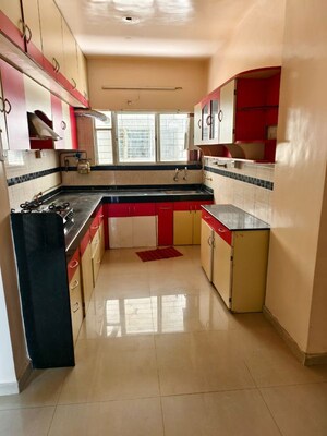 Kitchen in 2 BHK Apartment at G K Daffodils Housing Society, Pimple Saudagar – for Rent