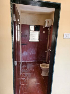 Bathroom in 2 BHK Apartment at G K Daffodils Housing Society, Pimple Saudagar – for Rent
