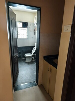 Bathroom in 2 BHK Apartment at G K Daffodils Housing Society, Pimple Saudagar – for Rent