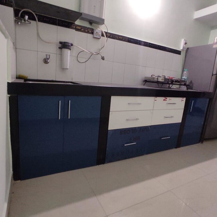 Kitchen, ramesh-hermes-heritage-row-houses 2.5 Bedroom 1250 Sq.Ft. Apartment In Shastrinagar Pune 10483126