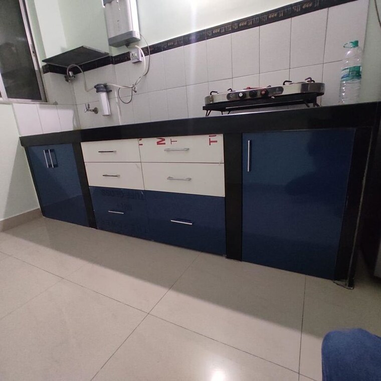 Kitchen, ramesh-hermes-heritage-row-houses 2.5 Bedroom 1250 Sq.Ft. Apartment In Shastrinagar Pune 10483126