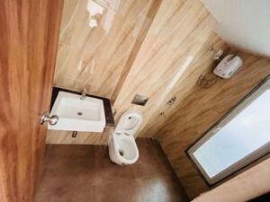 Bathroom in 1 BHK Apartment at Lodha Amara, Kolshet Road – for Rent