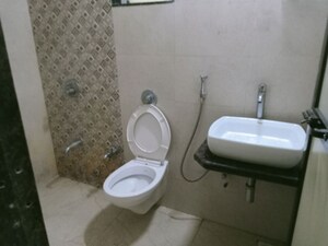 Bathroom in 2 BHK Apartment at Vihang Hills, Ghodbunder Road – for Rent