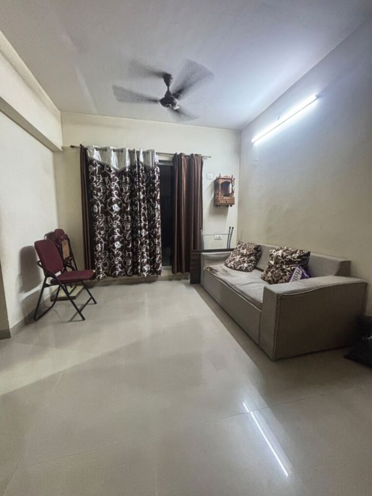 Living Room, rosa-elite 1 Bedroom 450 Sq.Ft. Apartment In Bhayandarpada Thane 10483225