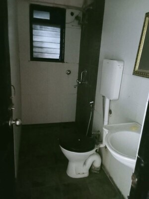 Bathroom in 2 BHK Apartment at Lalani Residency, Kavesar – for Rent