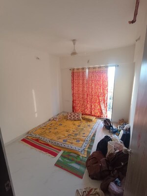 Bedroom in 1 BHK Apartment at Metropolis Bayside, Kasarvadavali – for Rent