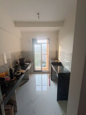 Kitchen in 1 BHK Apartment at Metropolis Bayside, Kasarvadavali – for Rent