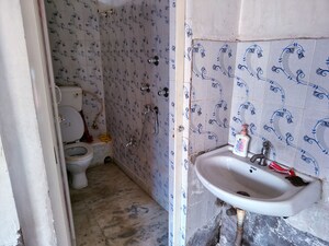 Bathroom in  Apartment at Bhatpara – for Sale