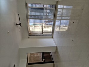 Building Lobby in 2 BHK Apartment at Bhagwati Elysia, Pushpak Nagar – for Rent