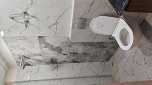 Bathroom in 3 BHK Builder Floor at Mahindra Enclave – for Sale