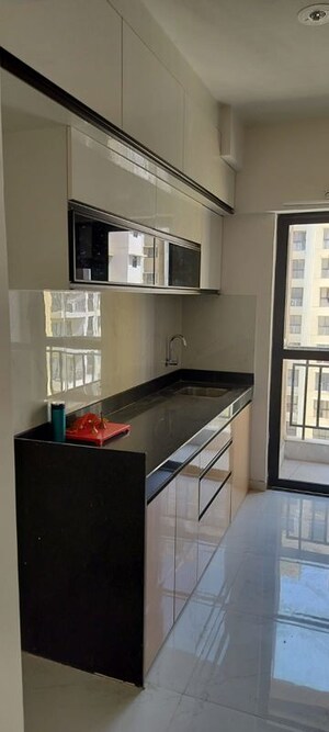 Kitchen in 2 BHK Apartment at Runwal Gardens, Dombivli East – for Rent