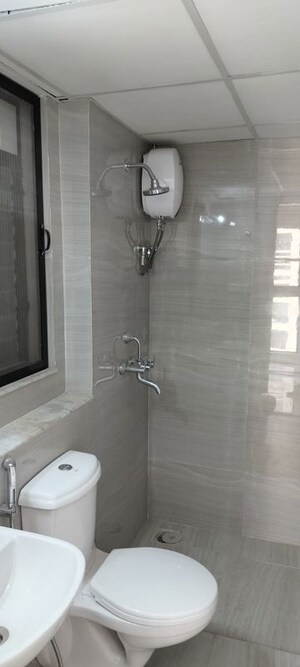Bathroom in 2 BHK Apartment at Runwal Gardens, Dombivli East – for Rent