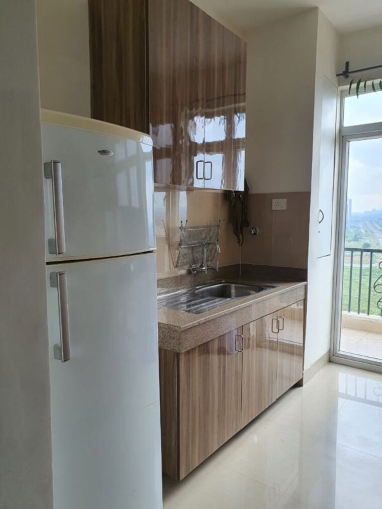 Kitchen, emaar-emerald-estate 3.5 Bedroom 1300 Sq.Ft. Apartment In Sector 65 Gurgaon 10483972