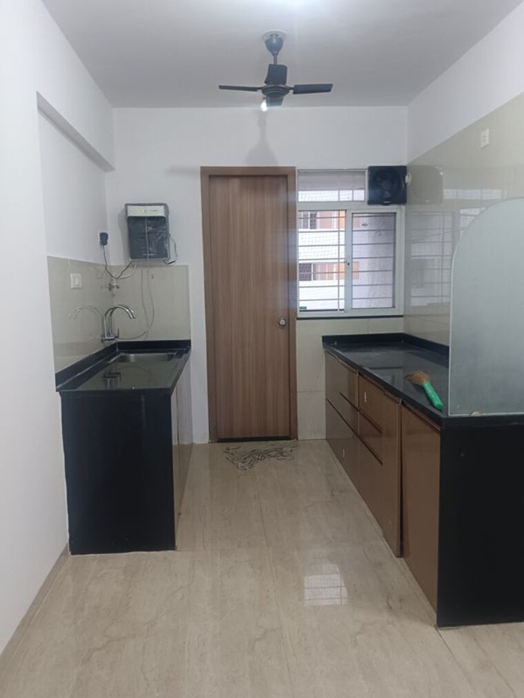 Kitchen, tirupati-regalia-phase-2 2.5 Bedroom 1010 Sq.Ft. Apartment In Vishrantwadi Pune 10483986