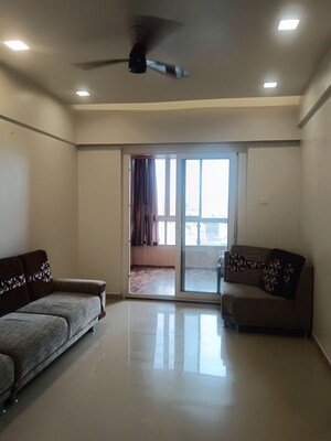 Living Room in 2 BHK Apartment at Tirupati Kashi Ganga, Dhanori – for Rent