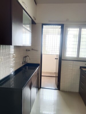Kitchen in 2 BHK Apartment at Tirupati Kashi Ganga, Dhanori – for Rent