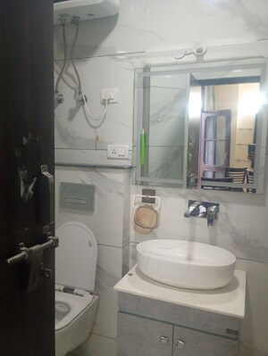 Bathroom in 4 BHK Apartment at Sector 10 Dwarka – for Rent