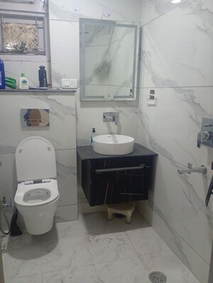 Bathroom in 4 BHK Apartment at Sector 10 Dwarka – for Rent