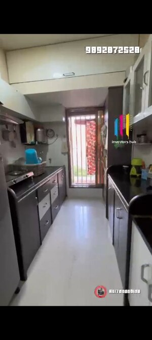 Kitchen in 2 BHK Apartment at Balaji Sky Heights, Mira Road – for Sale