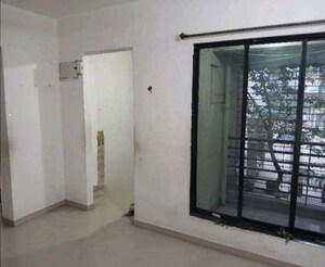 Living Room in 1 BHK Apartment at Orange Orchid, Taloja – for Rent