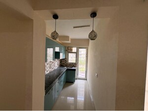 Kitchen in 2 BHK Apartment at Shree Vardhman Green Court, Sector 90 – for Rent