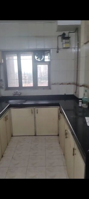 Kitchen in 2 BHK Apartment at Montreal Tower, Andheri West – for Rent