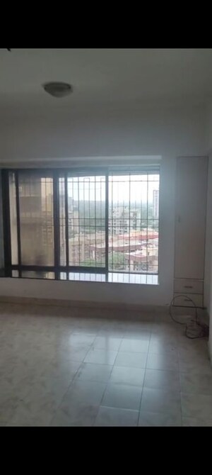 Room in 2 BHK Apartment at Montreal Tower, Andheri West – for Rent