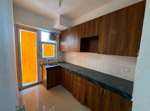 Kitchen in 2 BHK Apartment at Shree Vardhman Green Court, Sector 90 – for Rent