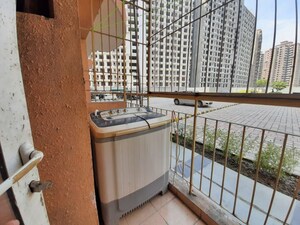 Balcony in 1 RK Apartment at Logix Blossom Zest, Sector 143 – for Rent