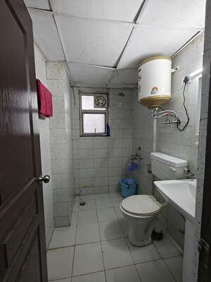 Bathroom in 1 RK Apartment at Logix Blossom Zest, Sector 143 – for Rent