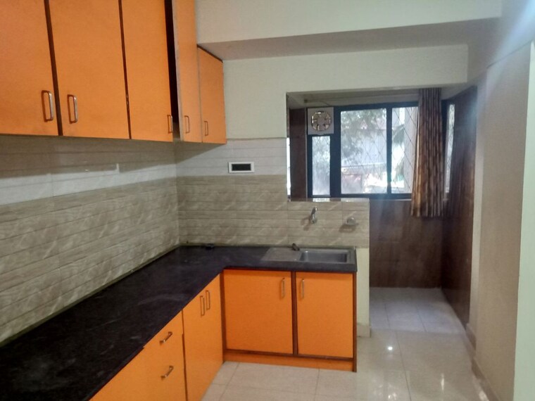 Kitchen, chikhla 2 Bedroom 950 Sq.Ft. Apartment In Chikhla Valsad 10484193