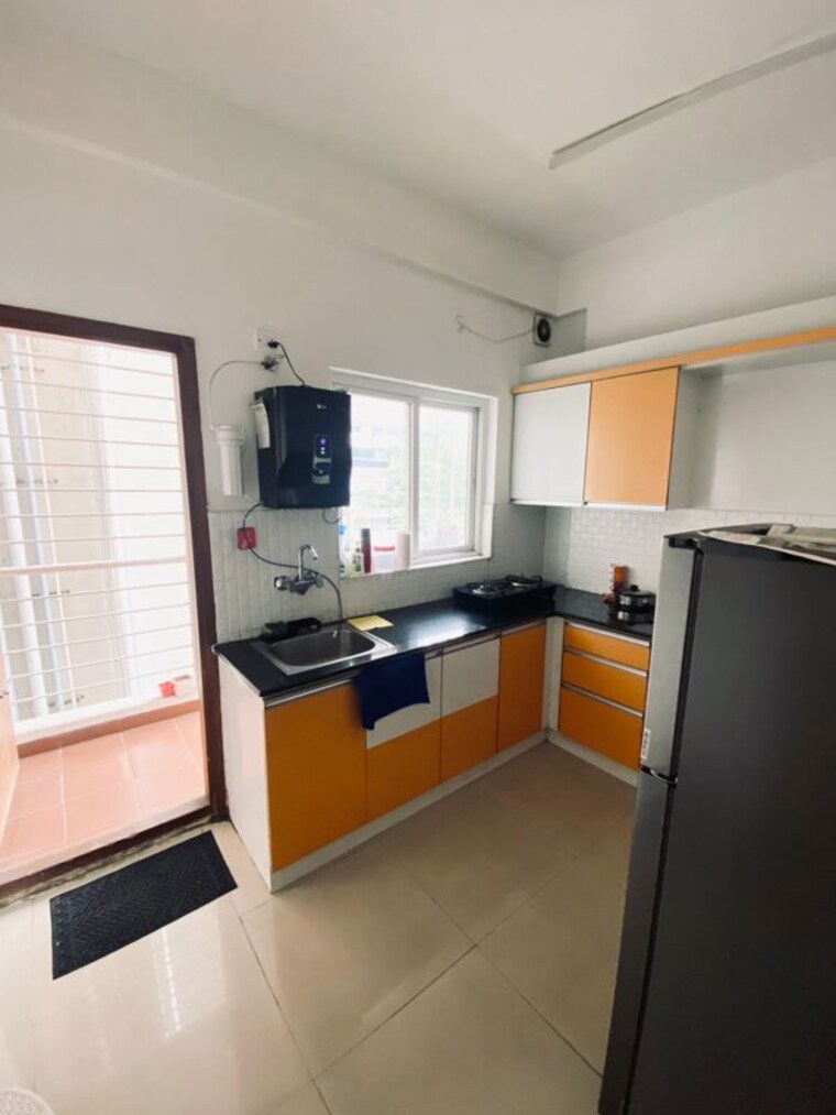 Kitchen, chikhla 2 Bedroom 950 Sq.Ft. Apartment In Chikhla Valsad 10484193