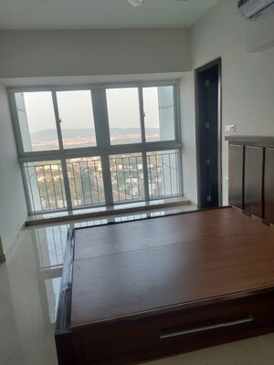 Room in 2 BHK Apartment at Ruparel Ariana, Parel – for Rent