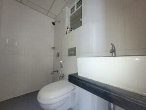 Bathroom in 1.5 BHK Apartment at Godrej Emerald, Ghodbunder Road – for Rent