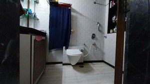 Bathroom in 1 BHK Apartment at Apna Ghar CHS, Malad East – for Rent