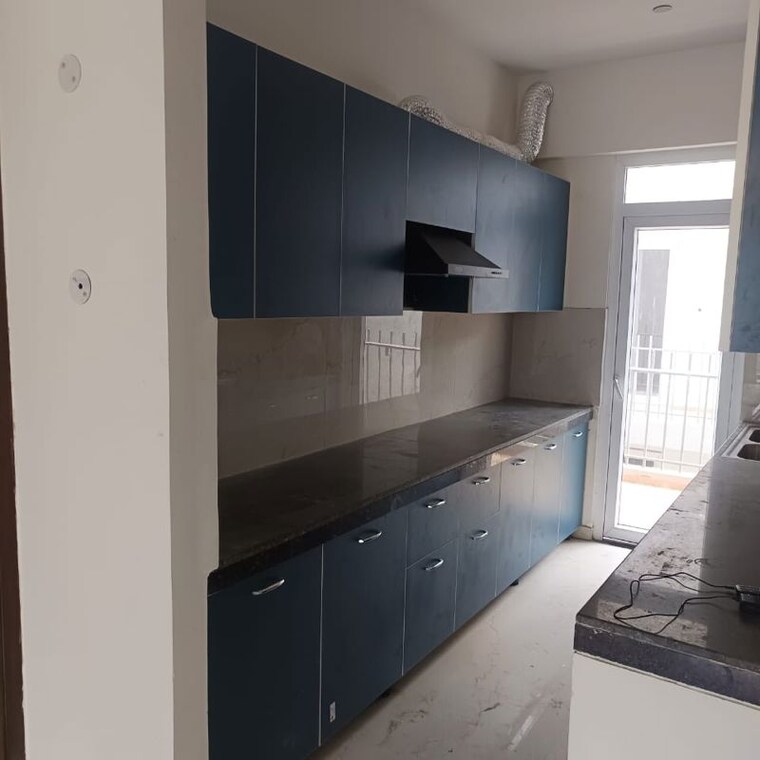 Kitchen, signature-global-the-millennia 2 Bedroom 812 Sq.Ft. Apartment In Sector 37d Gurgaon 10484495