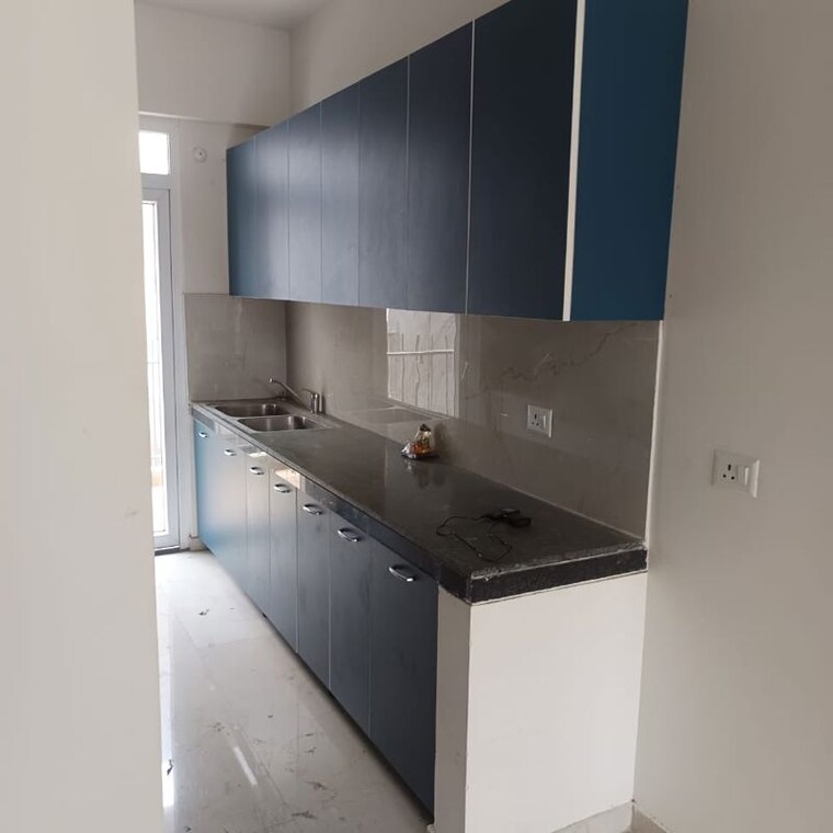 Kitchen, signature-global-the-millennia 2 Bedroom 812 Sq.Ft. Apartment In Sector 37d Gurgaon 10484495