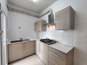 Kitchen in  Apartment at Bhartiya Nikoo Homes Phase 2, Thanisandra Main Road – for Rent