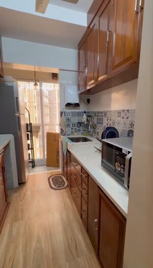 Kitchen in 1 BHK Apartment at Puranik Aarambh, Ghodbunder Road – for Rent