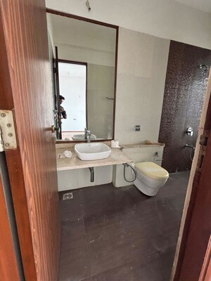 Bathroom in 2 BHK Apartment at Omkar Alta Monte, Malad East – for Sale