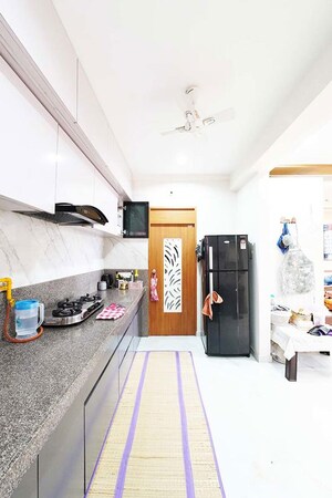 Kitchen in 2 BHK Apartment at Sargasan – for Sale