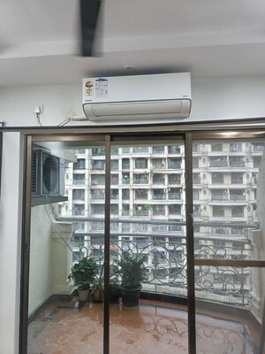 Balcony in 2 BHK Apartment at Tharwani Rosewood Heights, Kharghar Sector 10 – for Rent